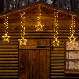 Stalattite decorata con stelle 3,2 x h 0,8 m, 950 microled bianco caldo
