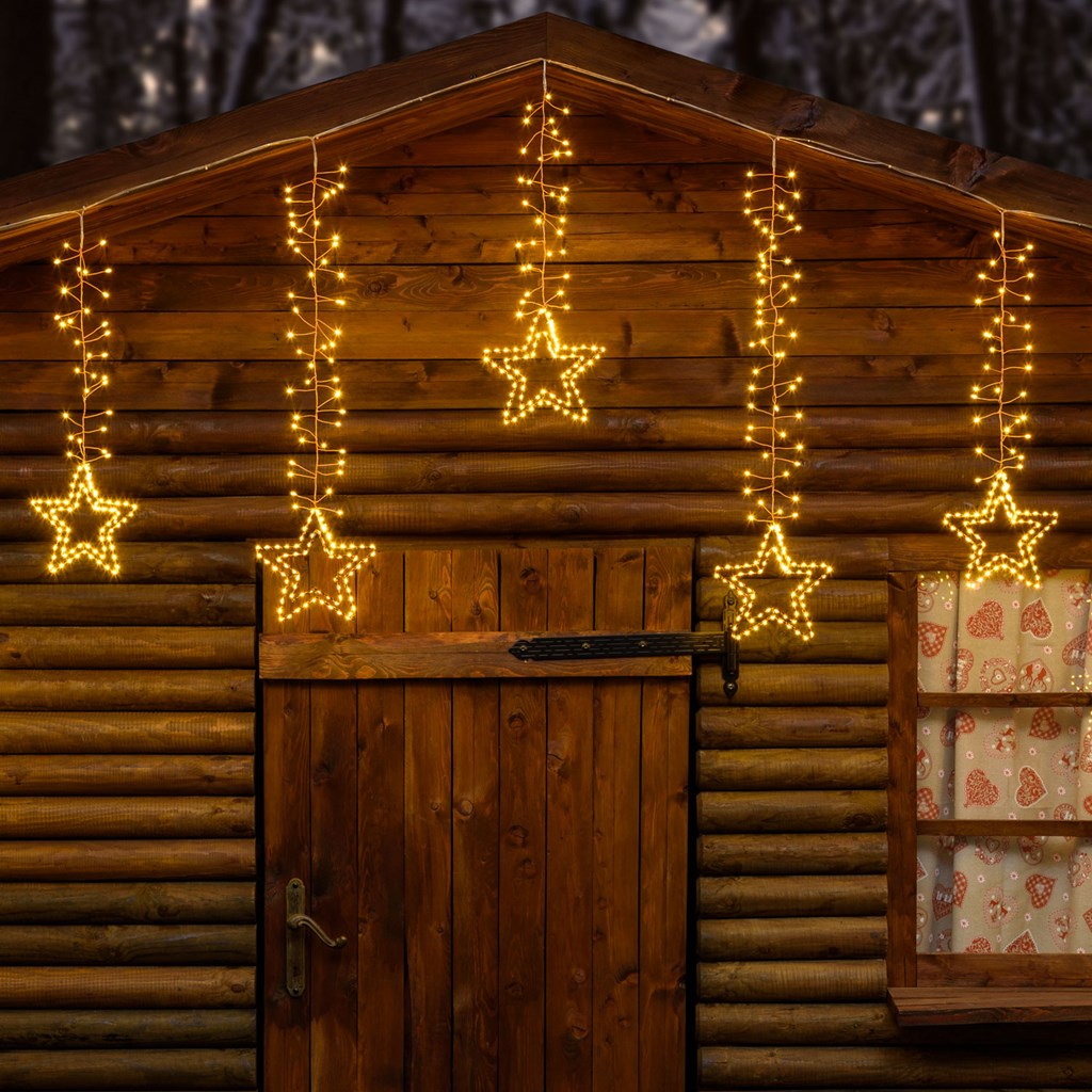 Stalattite decorata con stelle 3,2 x h 0,8 m, 950 microled bianco caldo